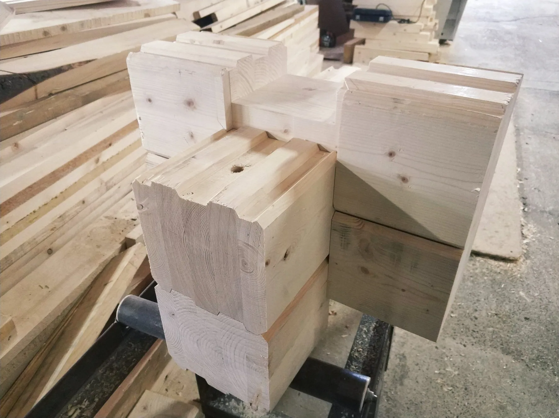 Precisely machined timber components prepared for assembly
